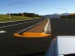 stamped asphalt median random stone pattern anchorage yellow end cap 1